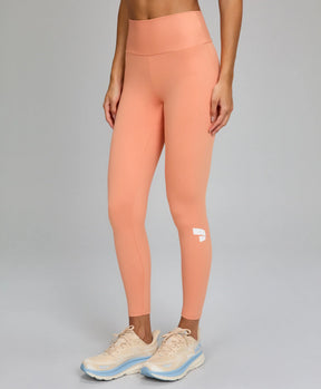 Legging Essentials Laranja Pessego Alto Giro
