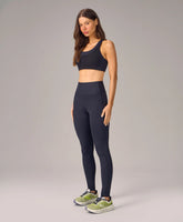 Legging Bolsos e Recortes Preto Alto Giro